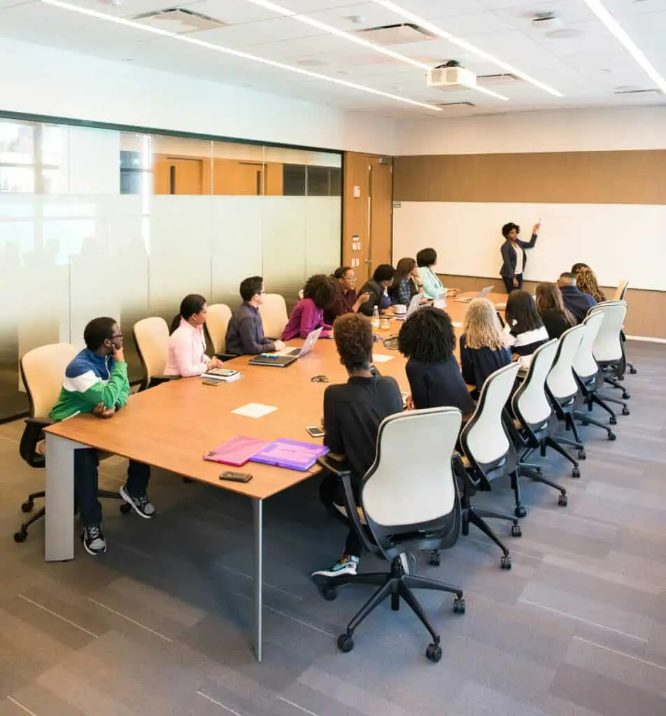 Training session on reasonable suspicion with instructor presenting to seated participants