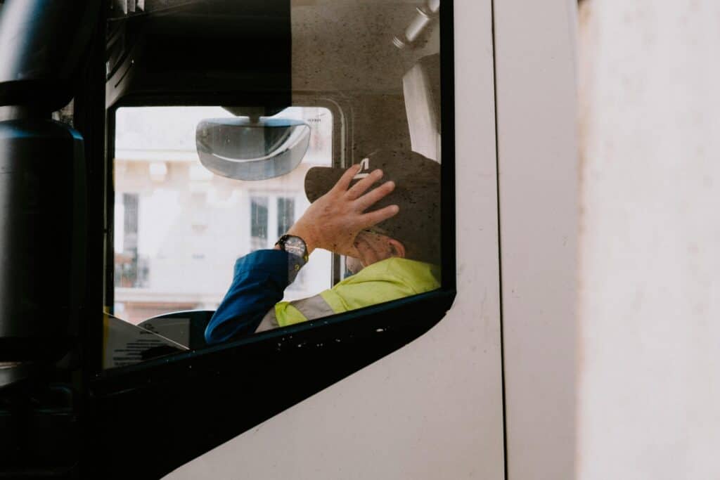 he scene suggests fatigue or possible impairment, highlighting concerns about substance use and employee well-being in the workplace.
